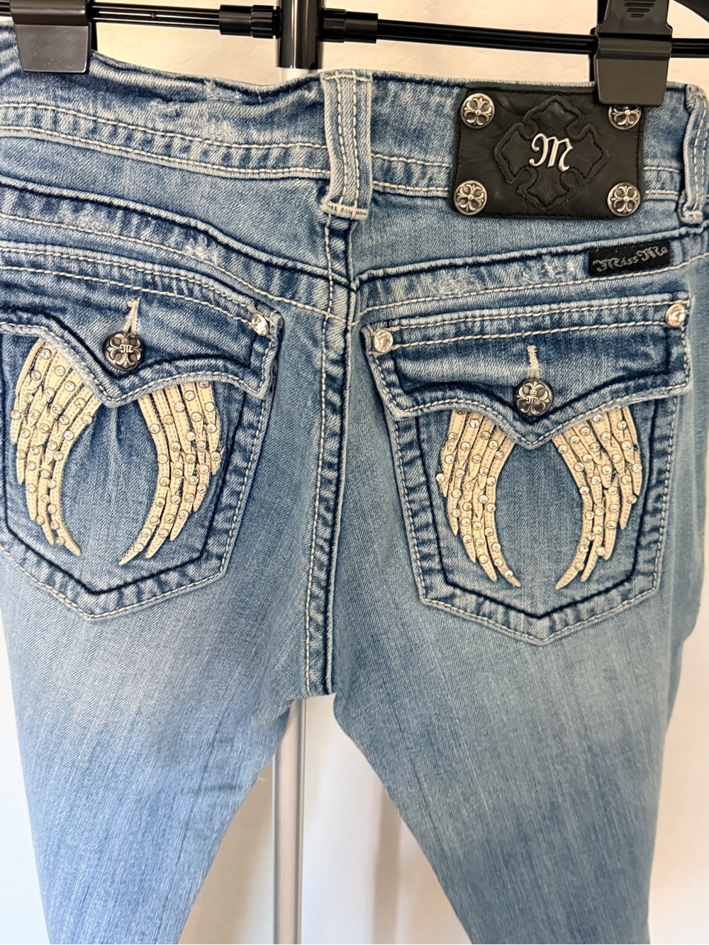 Miss Me Light Blue Jeans with Rhinestone Wing Pocket Embellishments